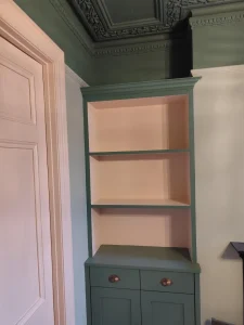 Painted built-in cabinet with shelving in Lewisham property
