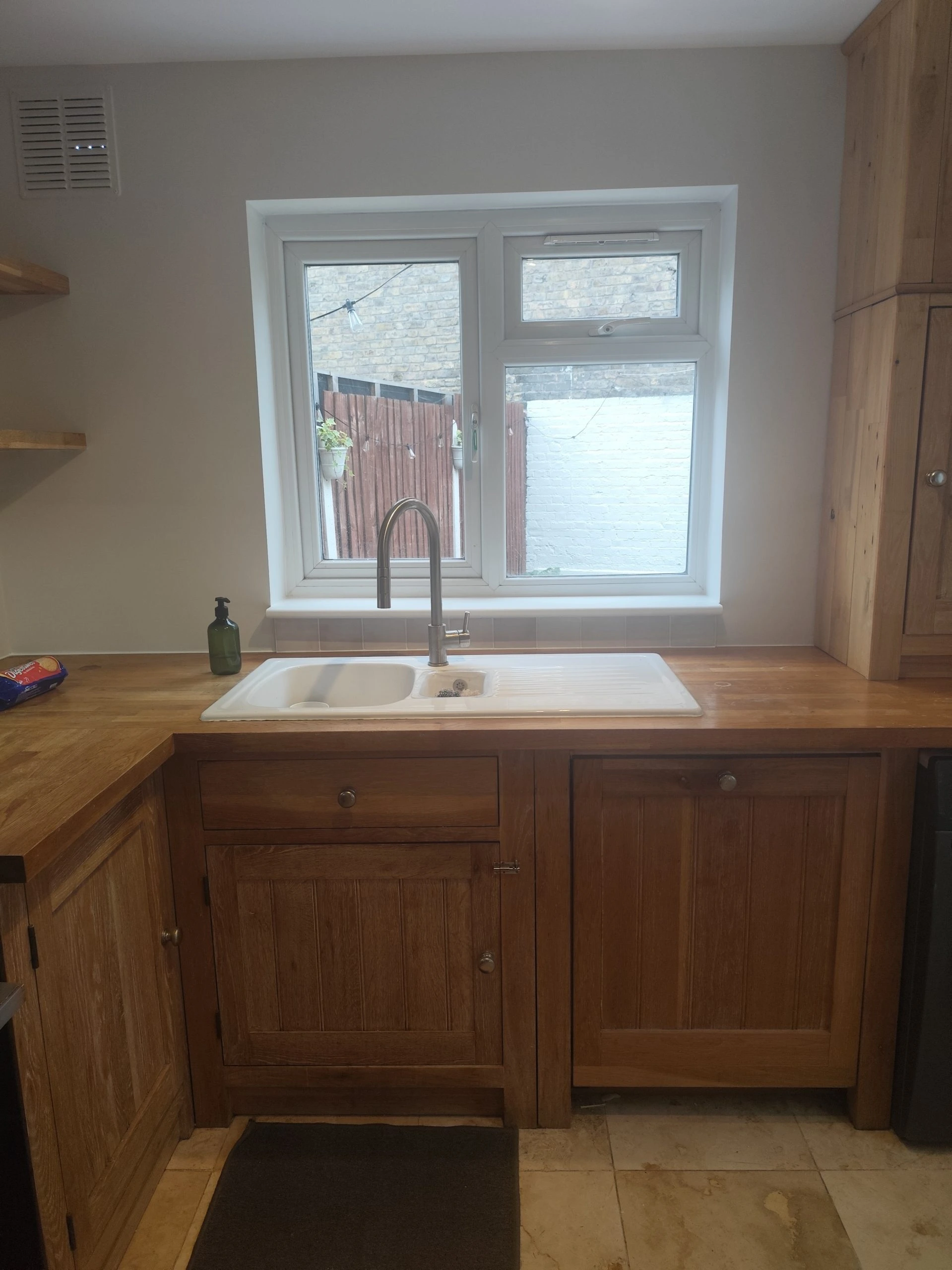 Detailed kitchen finishing with cabinet work and clean paint job